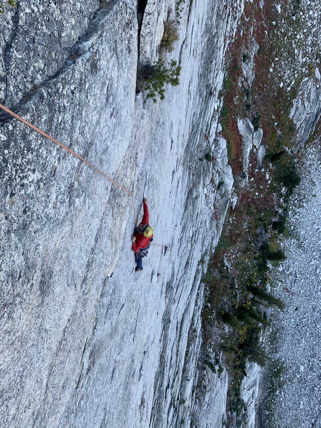 Michal Matyjasik leading Heart of Diamond on Storm Dome, with the valley below